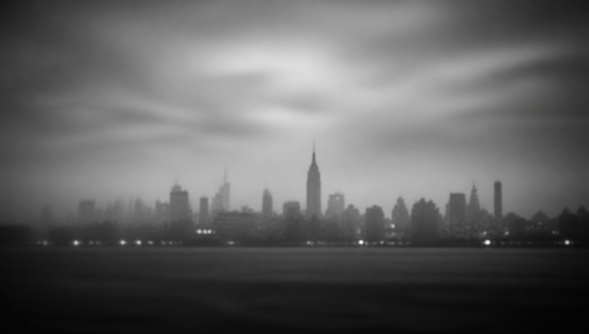 Blurred black and white New York City skyline